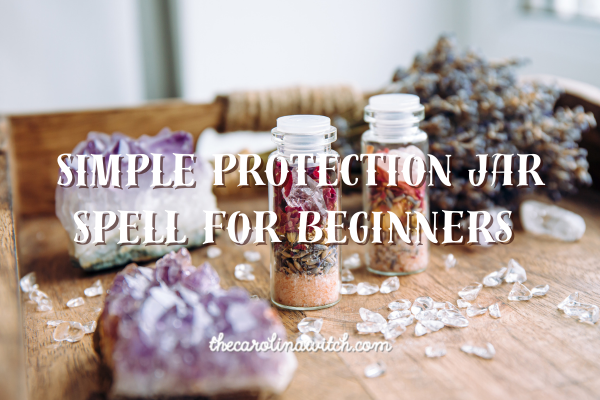 Simple Protection Jar Spell for Beginners blog post title with picture of two spell jars sitting on top of a wooden tray. Next to them are amethyst crystals